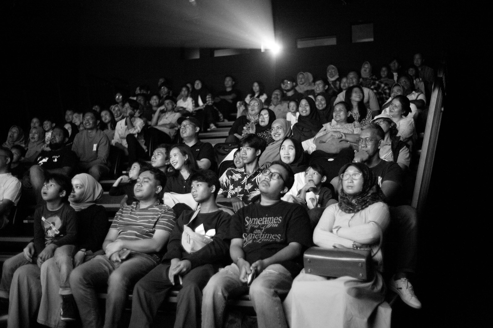 A black and white photo of a crowd of people