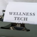 a close up of a typewriter with a paper on it